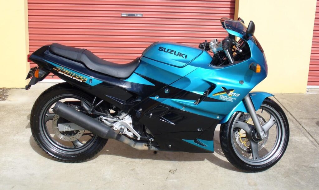 Suzuki GSX250 Across blue in front of garage