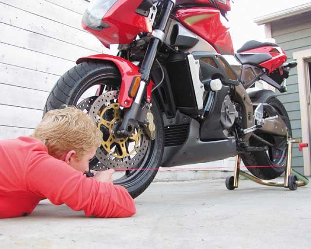 Check motorcycle wheel alignment with string 7