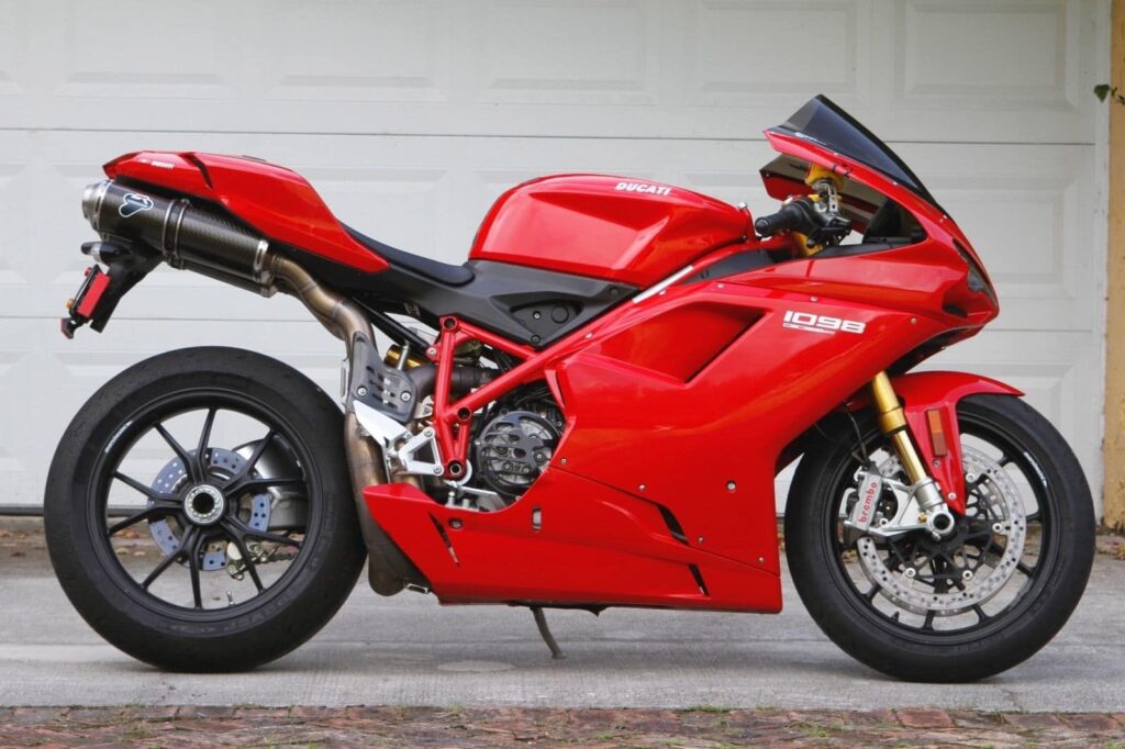 Red Ducati 1098, side profile, with under-seat exhaust and single-sided swing-arm