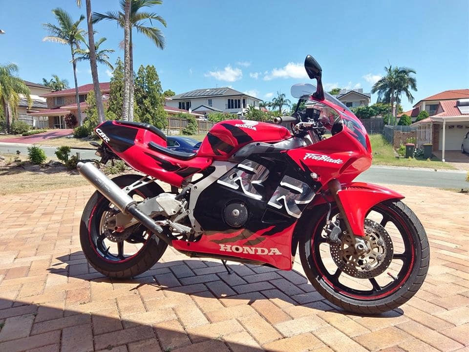 Red and black Honda MC22 CBR250RR