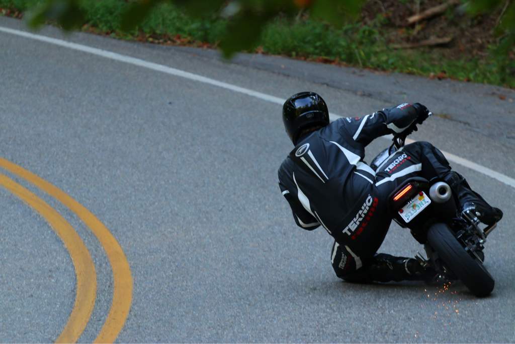 Getting a knee down on the Honda Grom in full leathers