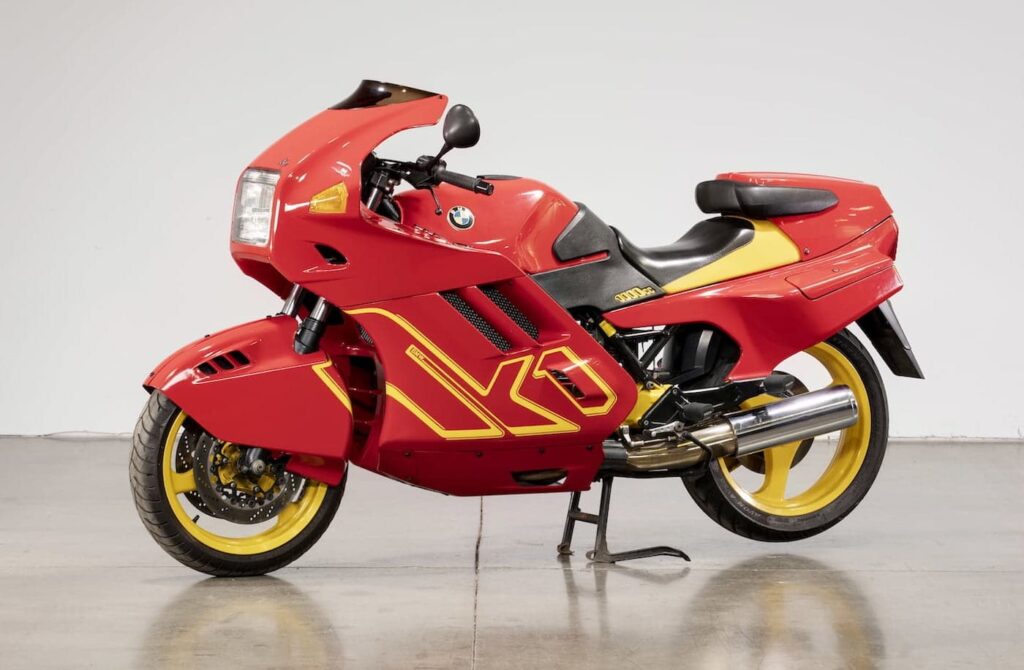 BMW K1 motorcycle with flying brick engine underneat the red and yellow bodywork