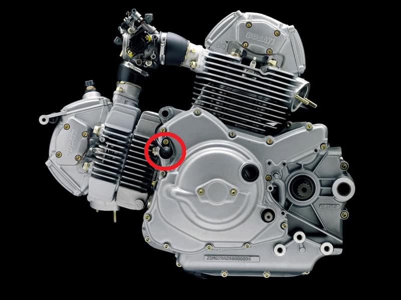 Location of the crankshaft position sensor (or timing sensor) on a Ducati motorcycle engine