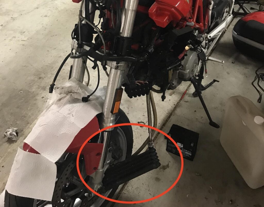 Ducati Multistrada 1000DS oil cooler hanging off oil lines