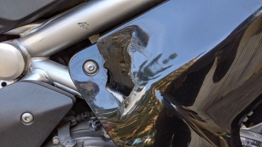 hole in motorcycle fairing that needed to be repaired