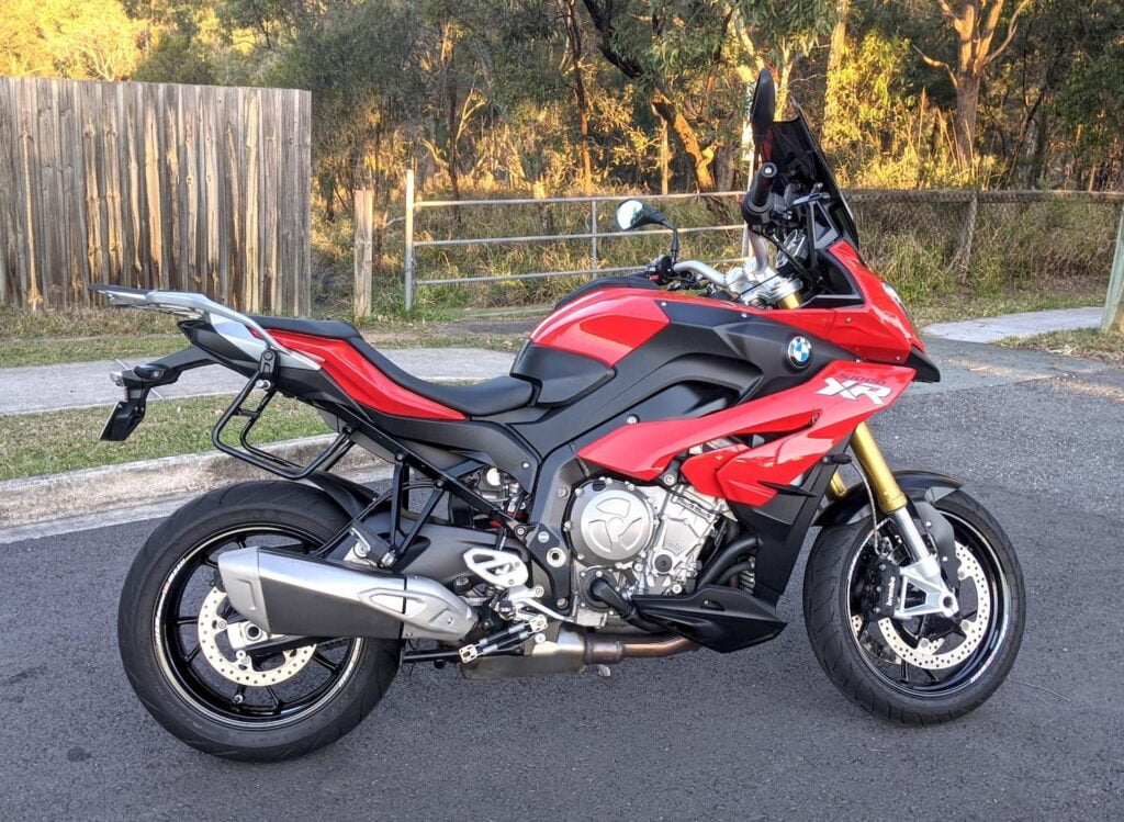 Red BMW S1000XR 2015 with buzzy handlebars