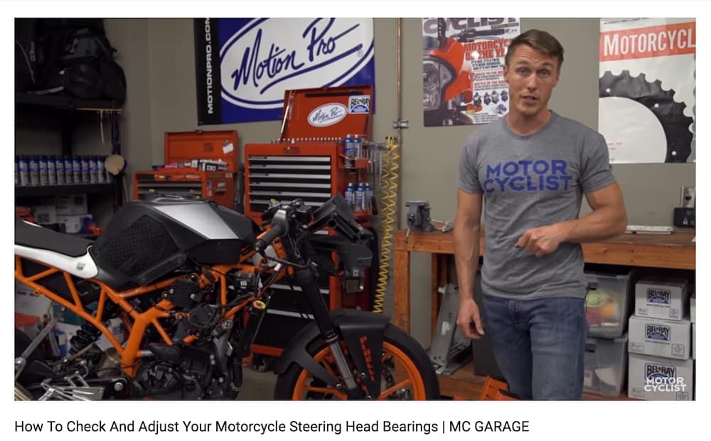 Checking motorcycle steering head bearings when inspecting a motorcycle.