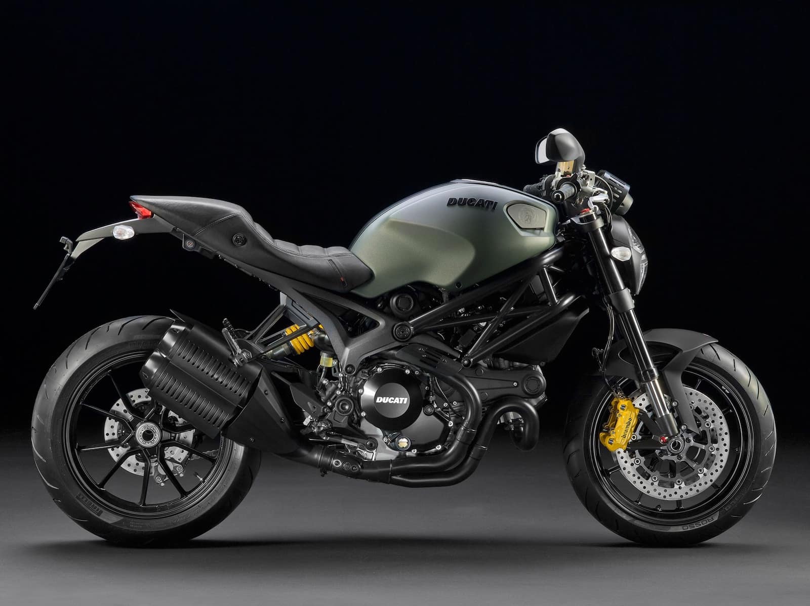 Ducati Monster 1100 EVO Diesel RHS profile green tank black background