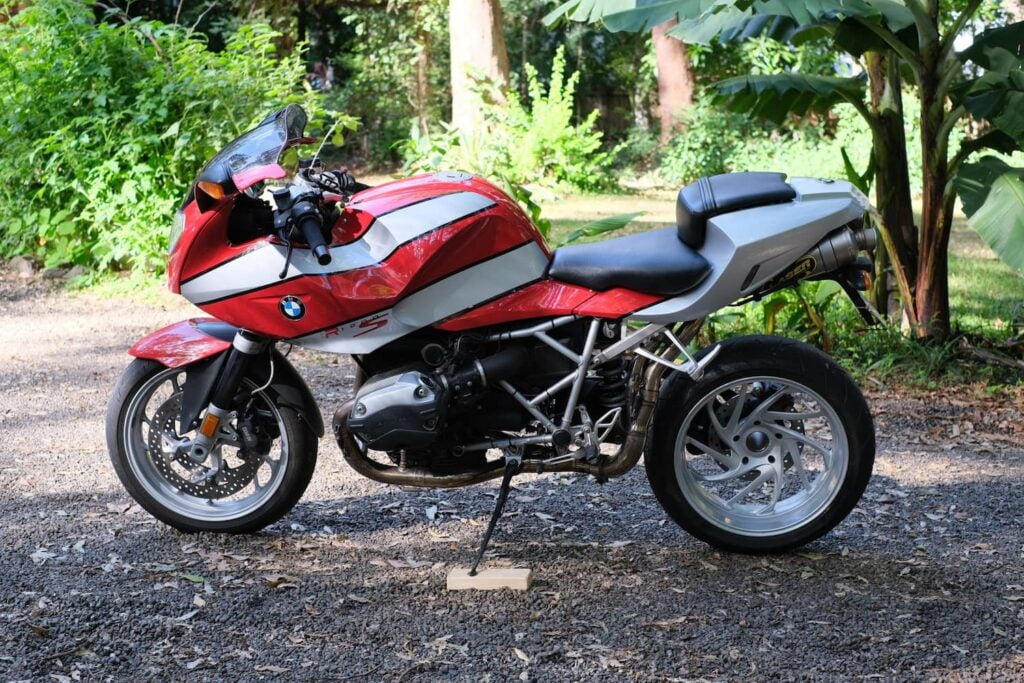 Using a block to keep a motorcycle upright for photography