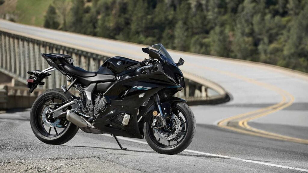 Black 2021 Yamaha YZF-R7 on twisty road