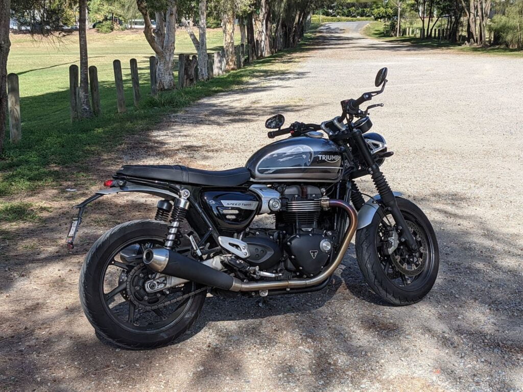 Triumph Speed Twin - parked on dirt road