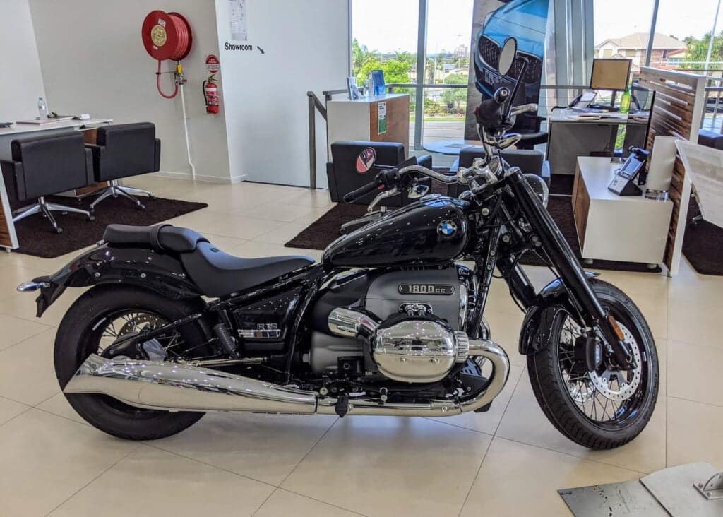 A BMW R 18 on the floor at a BMW motorrrad motorcycle dealership