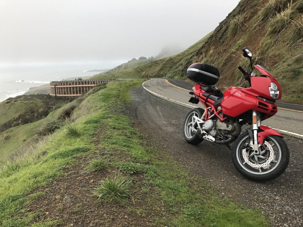 Ducati Multistrada 1000DS parked on the side of the PCH