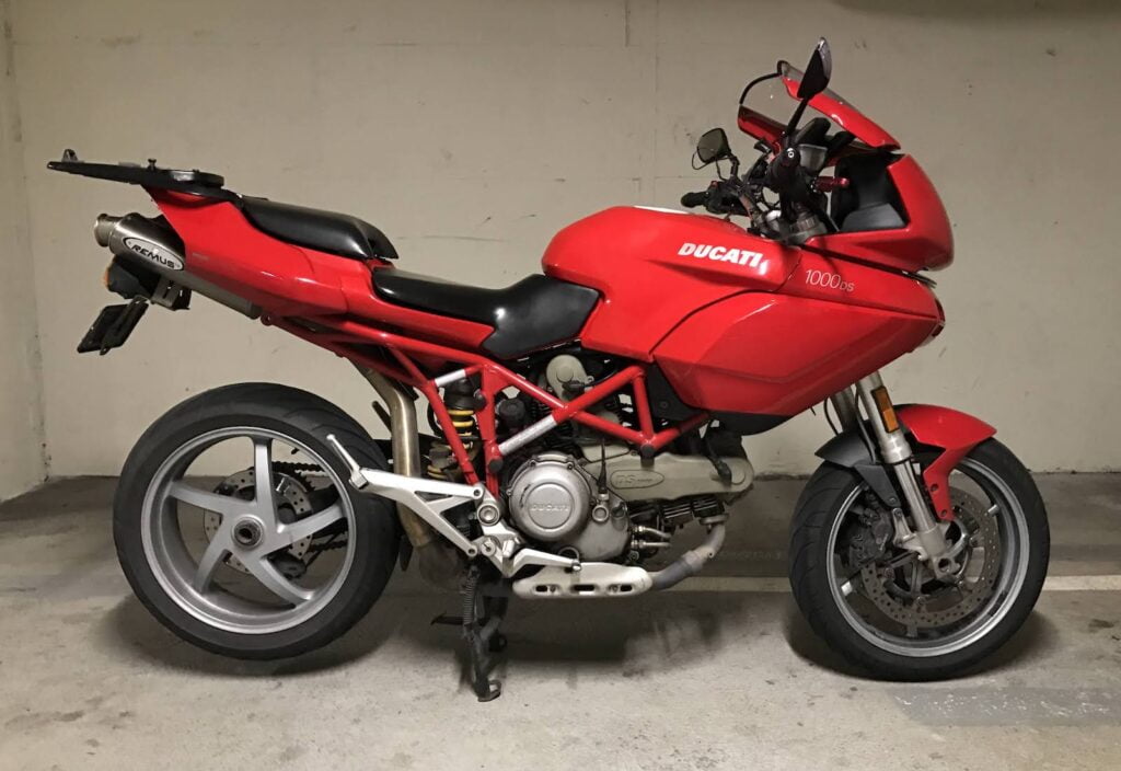 My multistrada 1000ds, red, parked in a garage