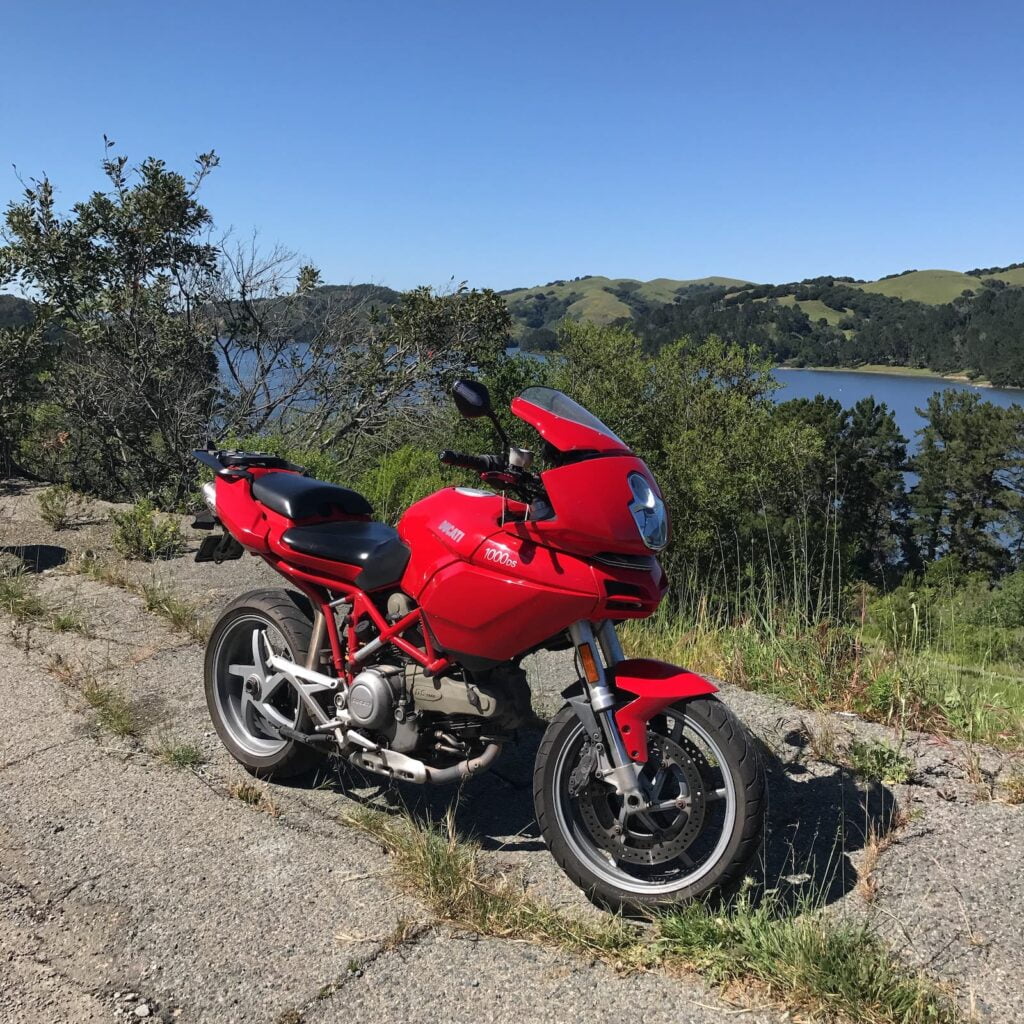 Ducati Multistrada 1000DS red parked on side of road