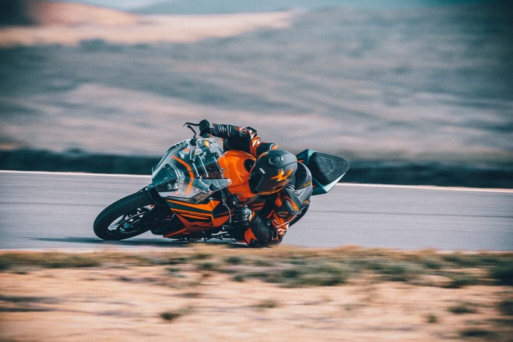 Fully leaned over 2022 KTM RC 390 with cornering ABS