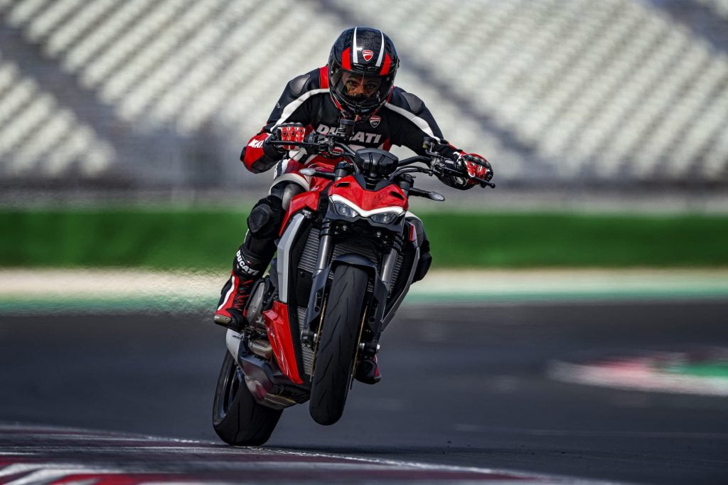 2022 Ducati Streetfighter V2 red riding sheelie