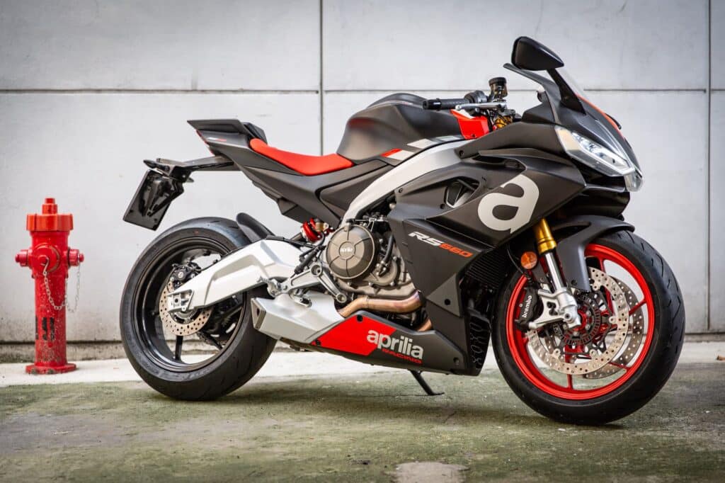Aprilia RS 660 review RHS static outdoor by fire hydrant