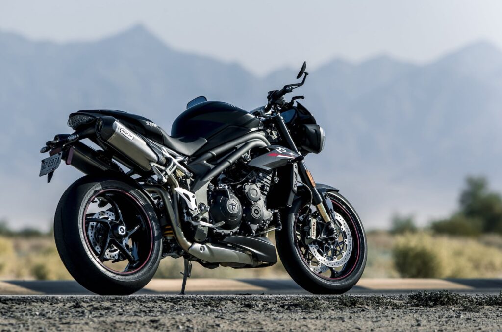 Triumph Speed Triple RS RHS exterior static on dirt road