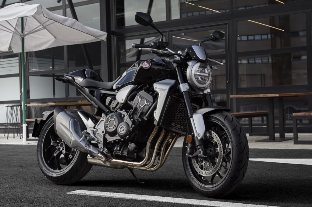 2018 Honda CB1000R Static black parked against steel pipes