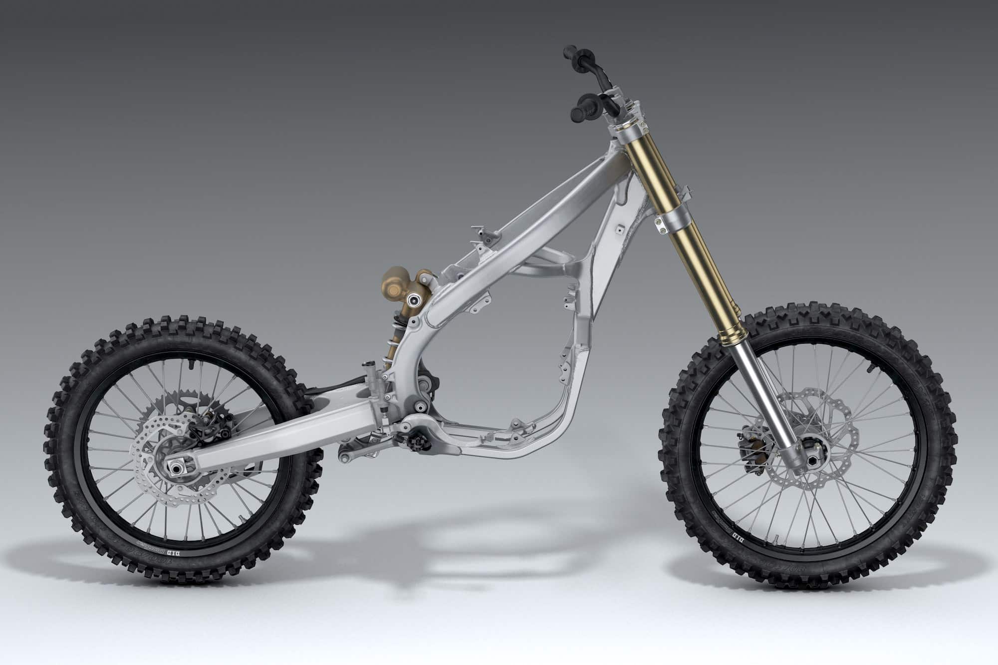 Honda Unicam Explained — How It Works and Why Honda Uses It 5 2021 Honda CRF450R chassis showing the compact single-cylinder engine between the frame spars