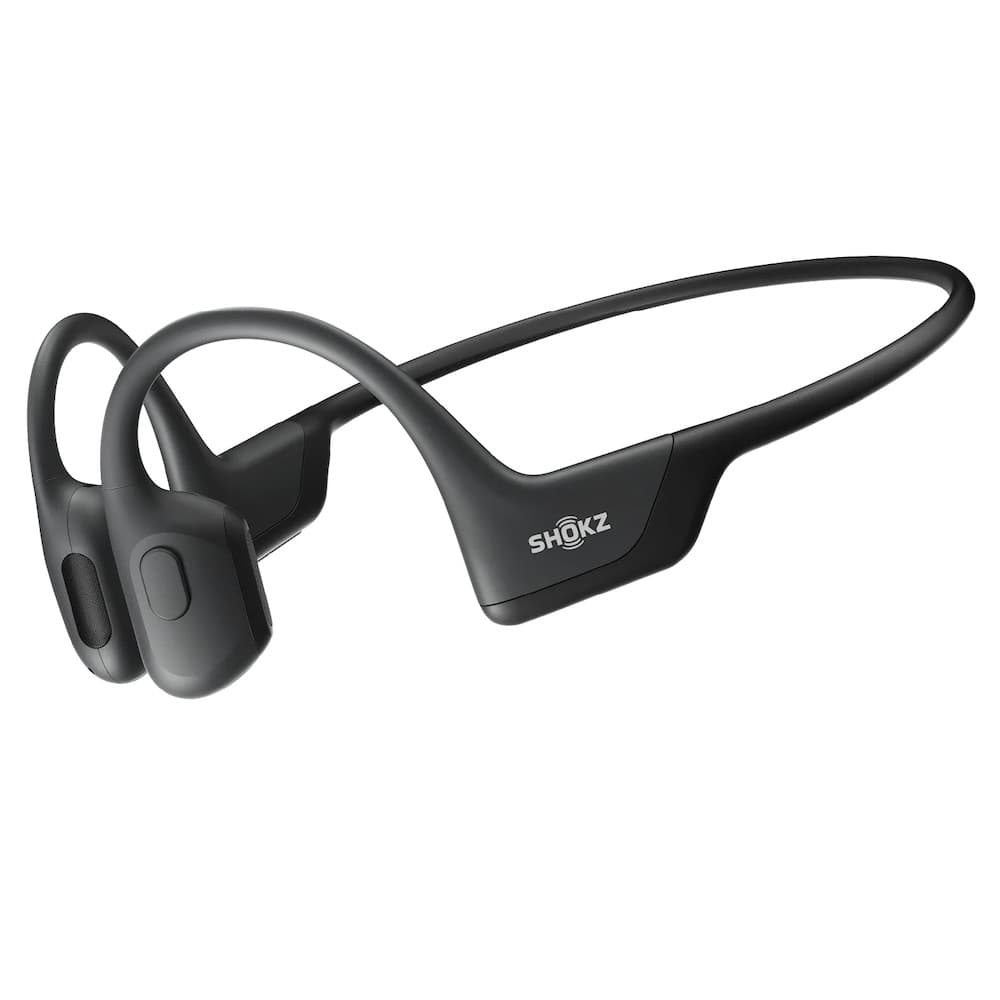 Shokz OpenRun bone conduction headphones used with motorcycle helmet