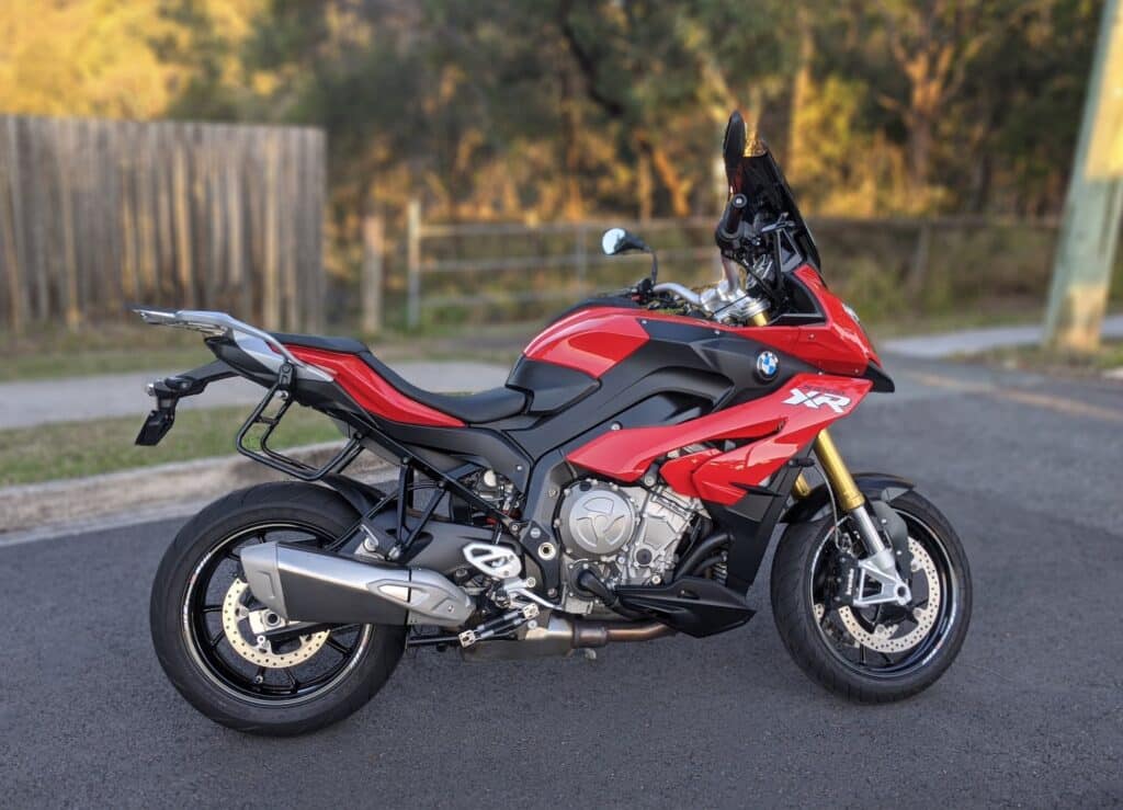 Red 2016 BMW S 1000 XR RHS static blur web