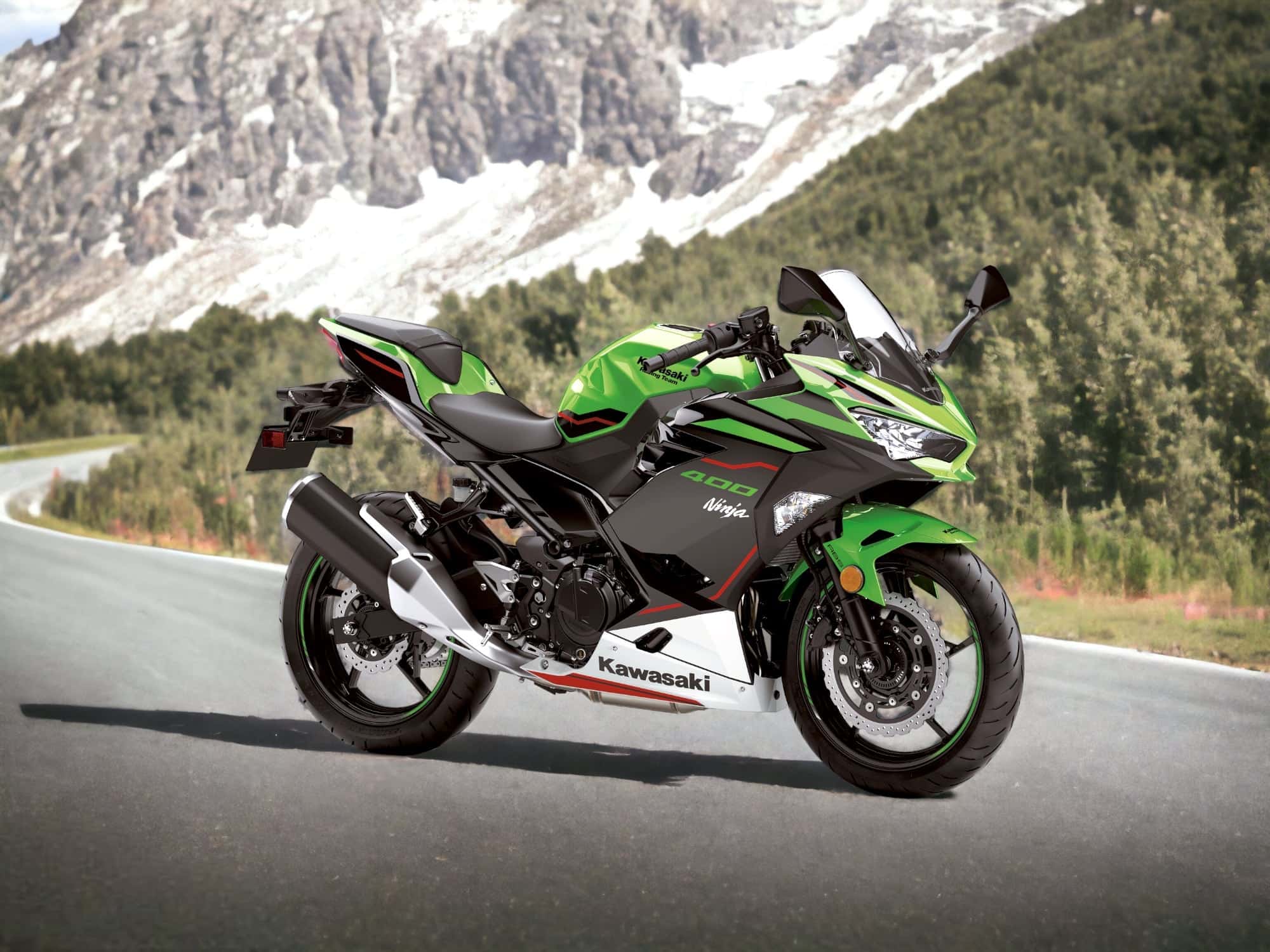 https://motofomo.com/wp-content/uploads/2023/07/Kawasaki-Ninja-400-EX400-on-winding-road.jpeg