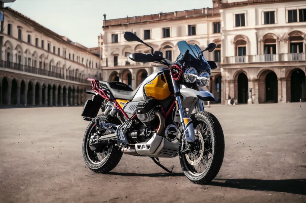 Moto Guzzi V85 TT Giallo Sahara parked in Italian piazza