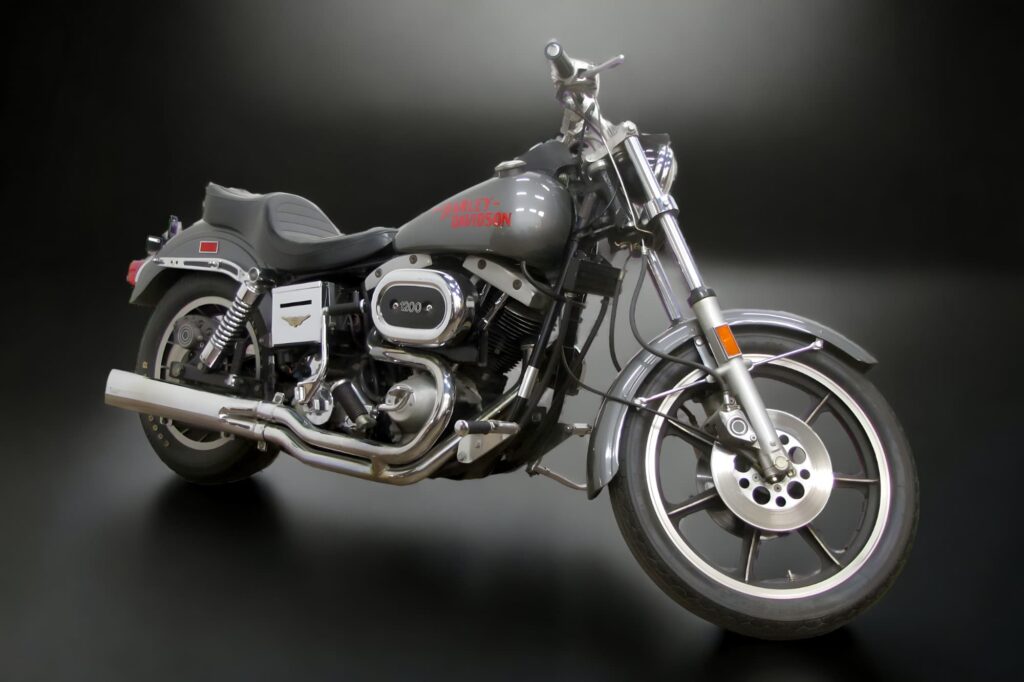 Harley-Davidson Low Rider Buyer’s Guide and Model History 4 1977 Harley-Davidson FXS Low Rider in orange and black