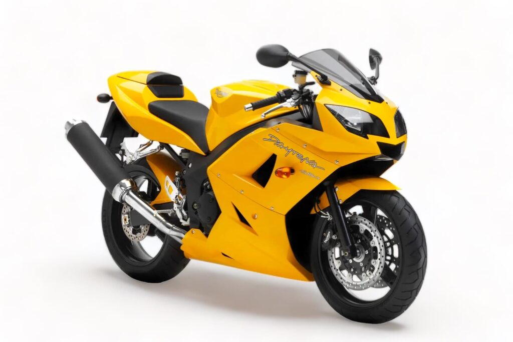 Triumph Daytona Model History and Buyer’s Guide (1967-2026) 14 Yellow Triumph Daytona 650, right-front three-quarter view