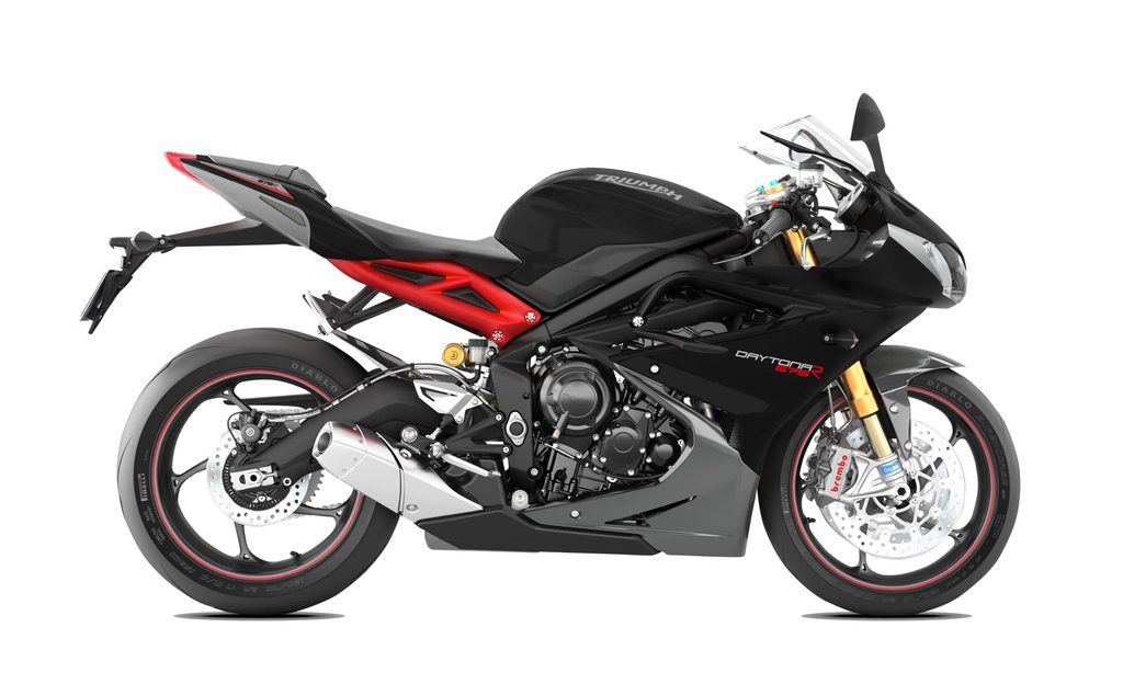 Triumph Daytona Model History and Buyer’s Guide (1967-2026) 19 Black second-generation Triumph Daytona 675R, right-side studio view