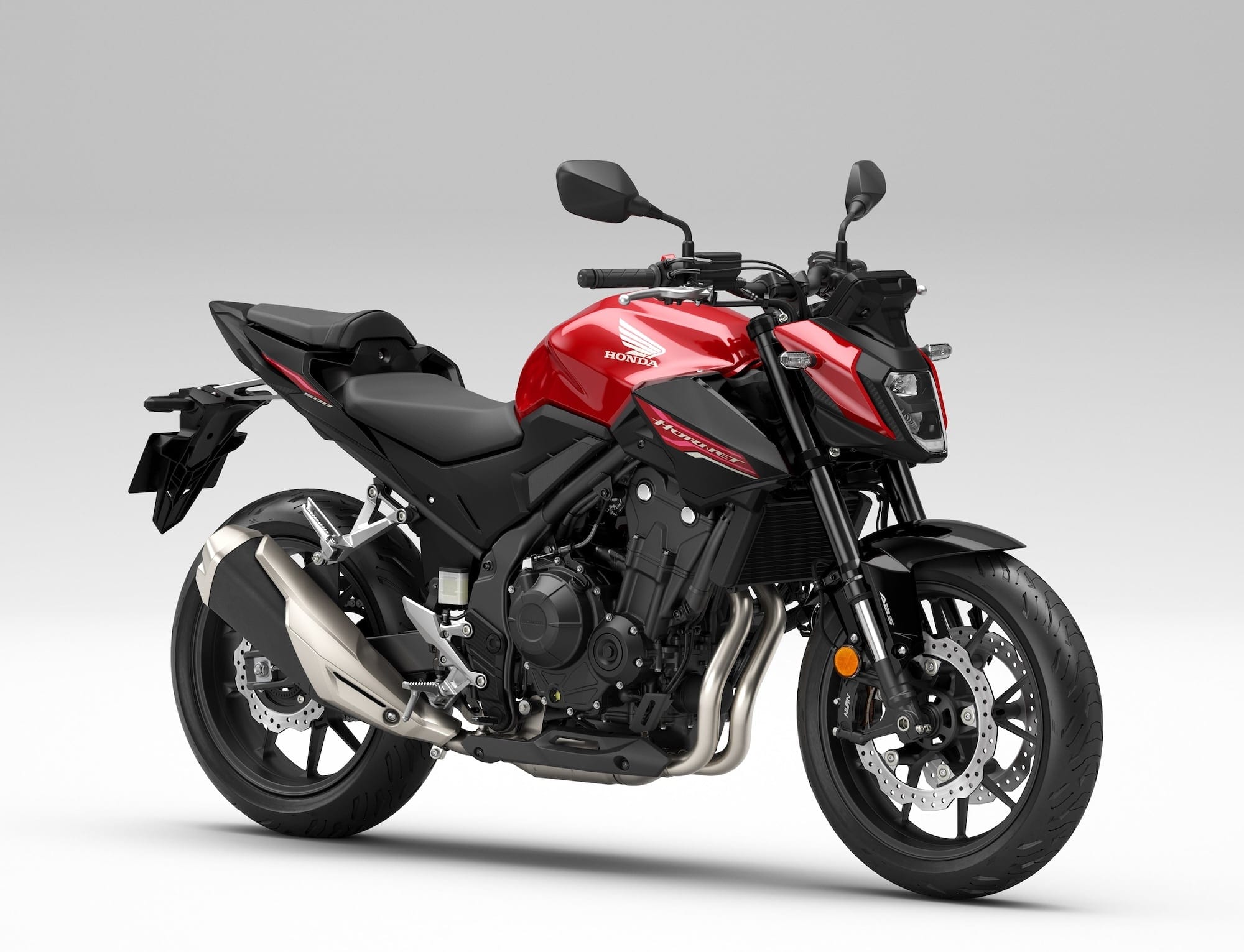 Kawasaki Ninja 300, 400, Ninja 500, Z300, Z400, and Z500 — Complete Buyer’s Guide 21 Red 2024 Honda CB500 Hornet viewed from the right front