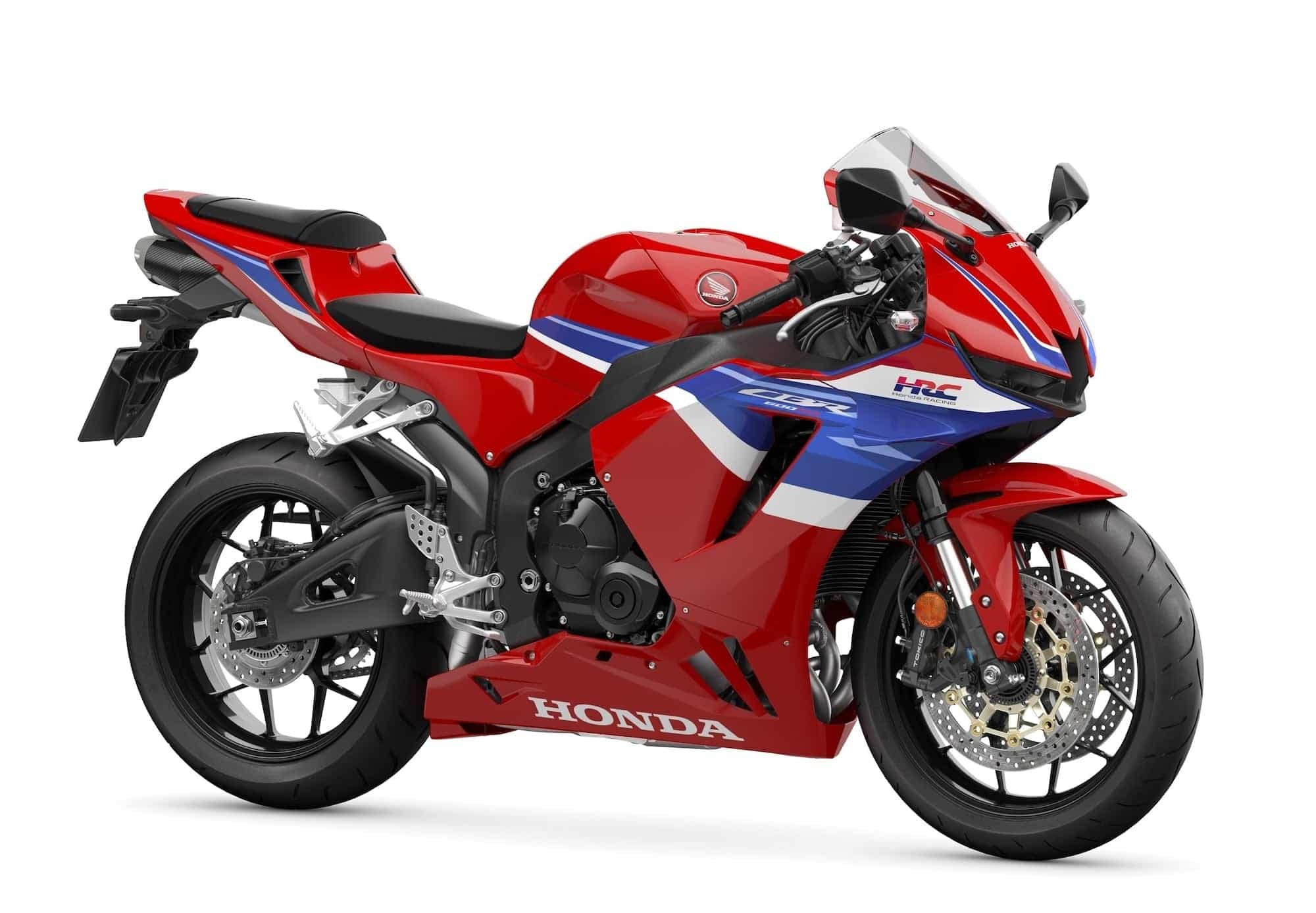 Honda CBR600RR — The Complete Buyer's Guide (2003-2026) 13 2024 Honda CBR600RR in HRC tricolour, studio right-front view