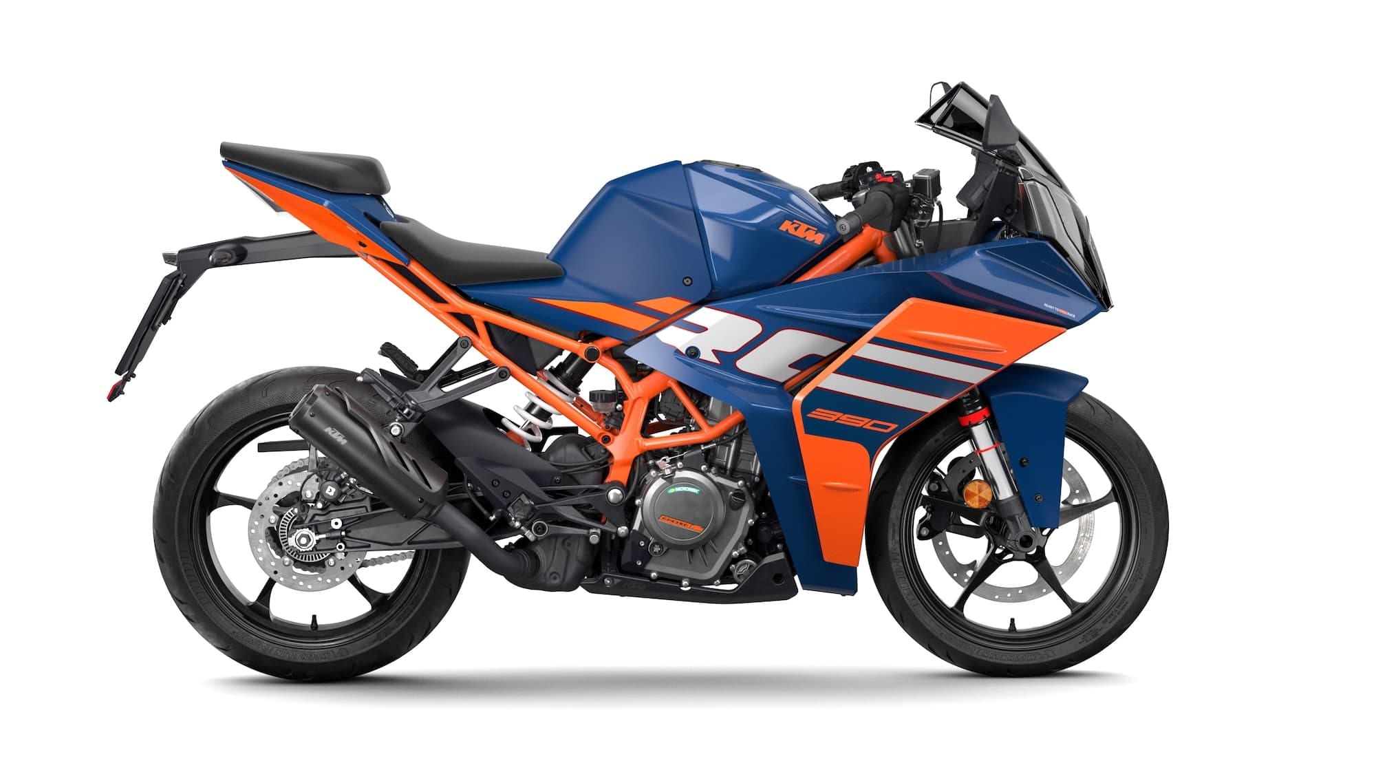 Kawasaki Ninja 300, 400, Ninja 500, Z300, Z400, and Z500 — Complete Buyer’s Guide 26 Blue and orange 2024 KTM RC 390 viewed from the right side