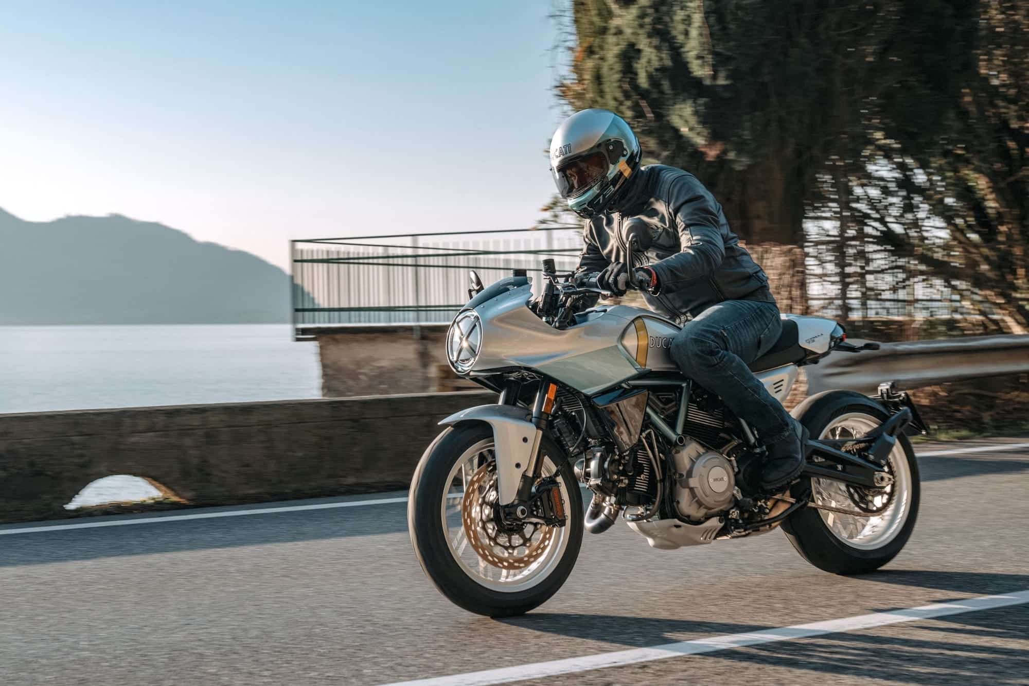 I want to be rich so I can have toys like the Ducati Formula 73 6 2026 Ducati Formula 73 being ridden beside a lake