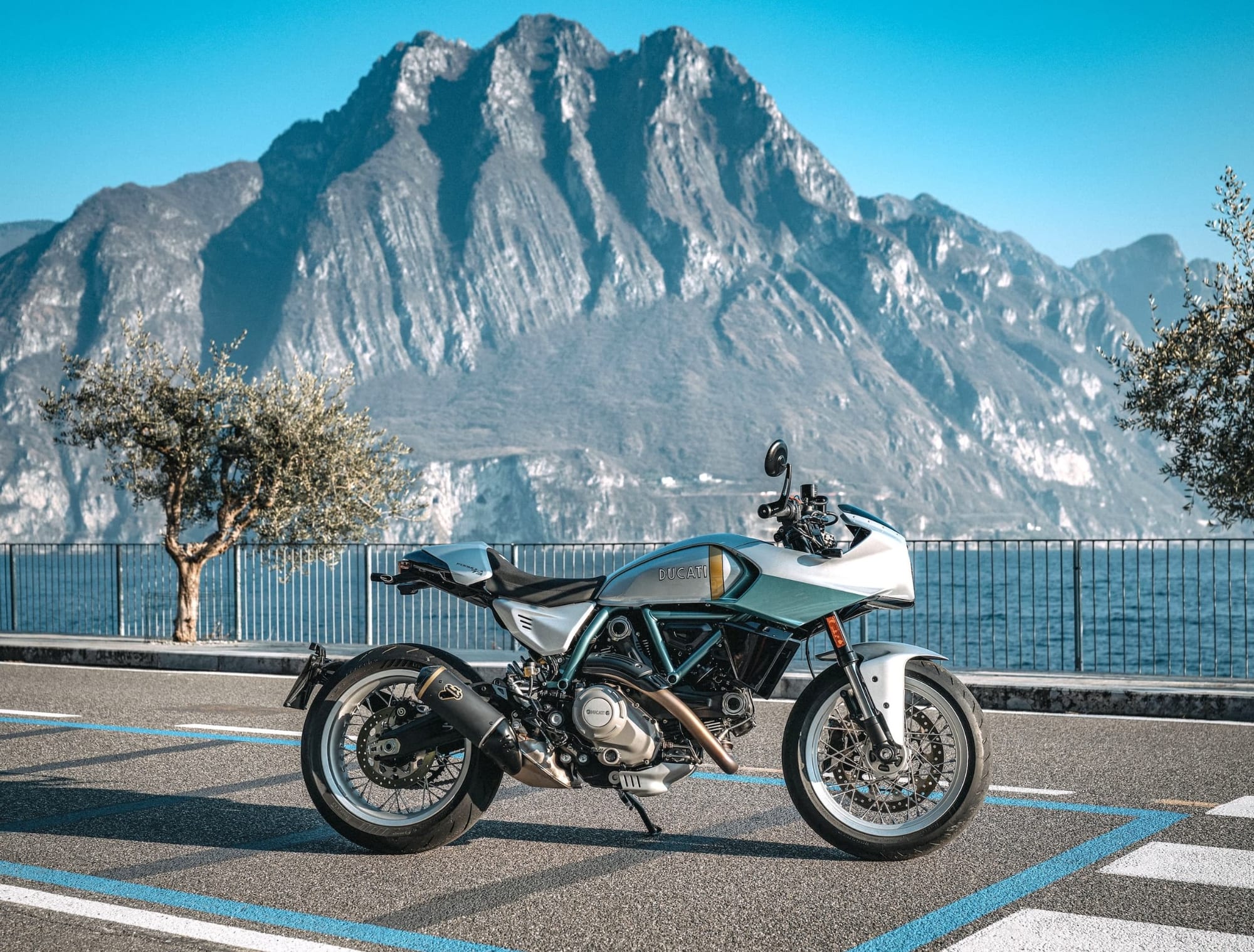 I want to be rich so I can have toys like the Ducati Formula 73 2 2026 Ducati Formula 73 side profile with mountains behind it