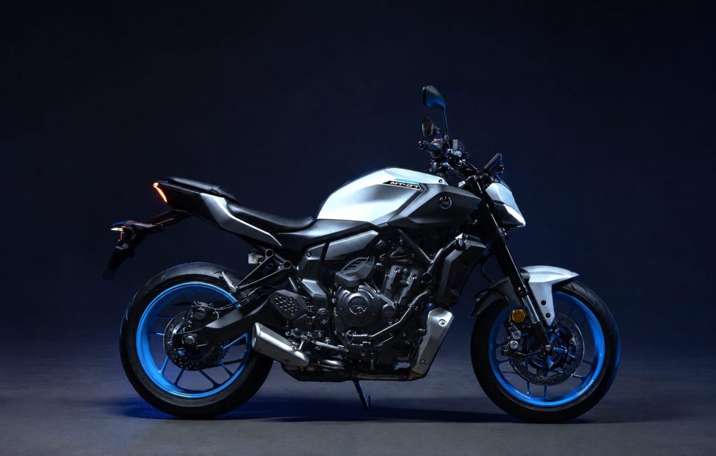 Yamaha MT-07 / FZ-07 and XSR700 Buyer’s Guide (2014–2026) 2 2026 Yamaha MT-07 in silver with blue wheels on a dark blue studio background