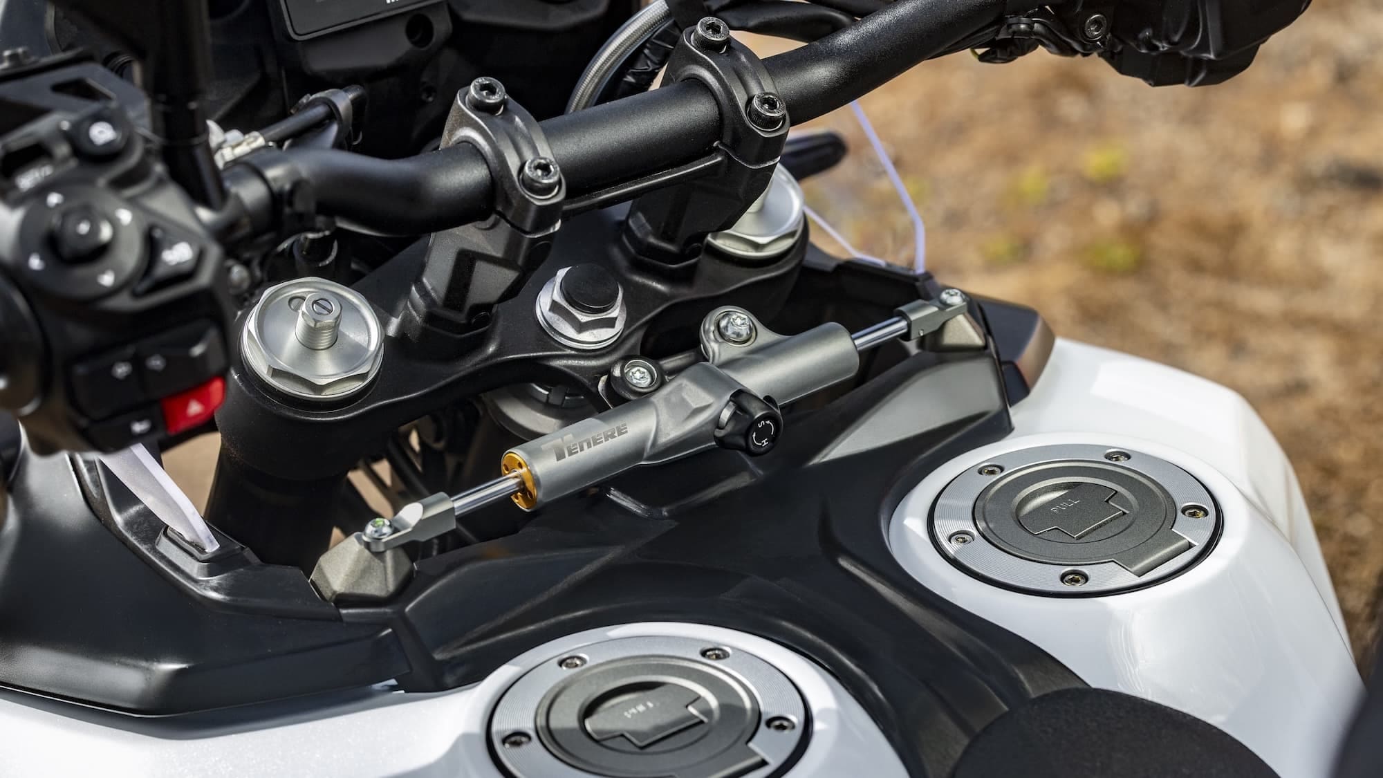 Yamaha Ténéré 700 Model Variants / Buyer’s Guide 2019-2026 22 Yamaha Ténéré 700 World Raid dual fuel tanks and steering damper