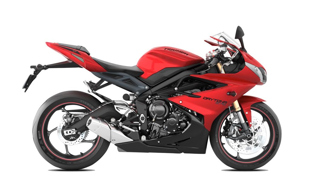 Triumph Daytona Model History and Buyer’s Guide (1967-2026) 18 Red 2013 Triumph Daytona 675, right-side studio view