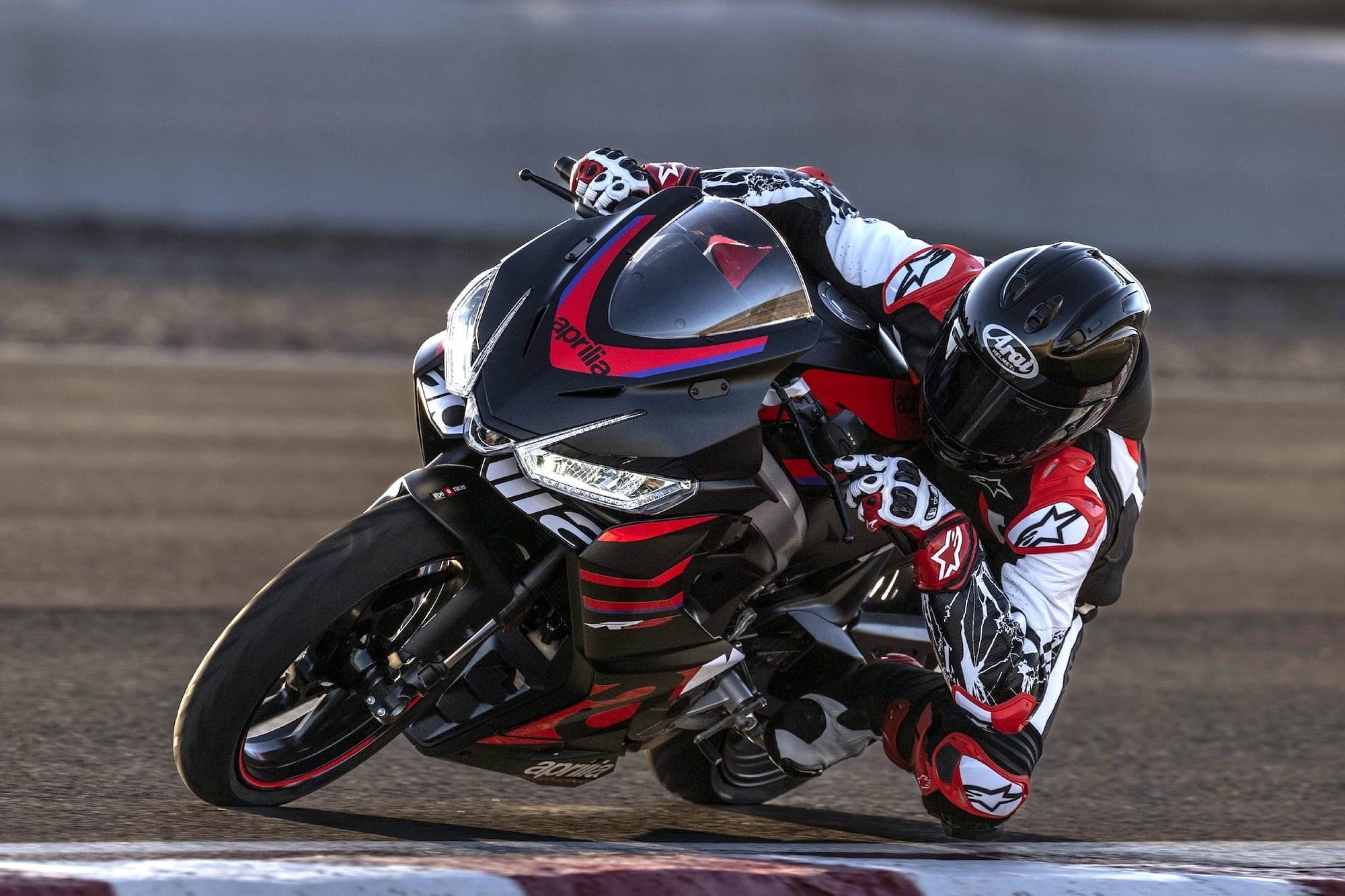 Aprilia RS 457 — More than the Sum of its Parts 7 Aprilia RS 457 Racing Stripes leaned over on track
