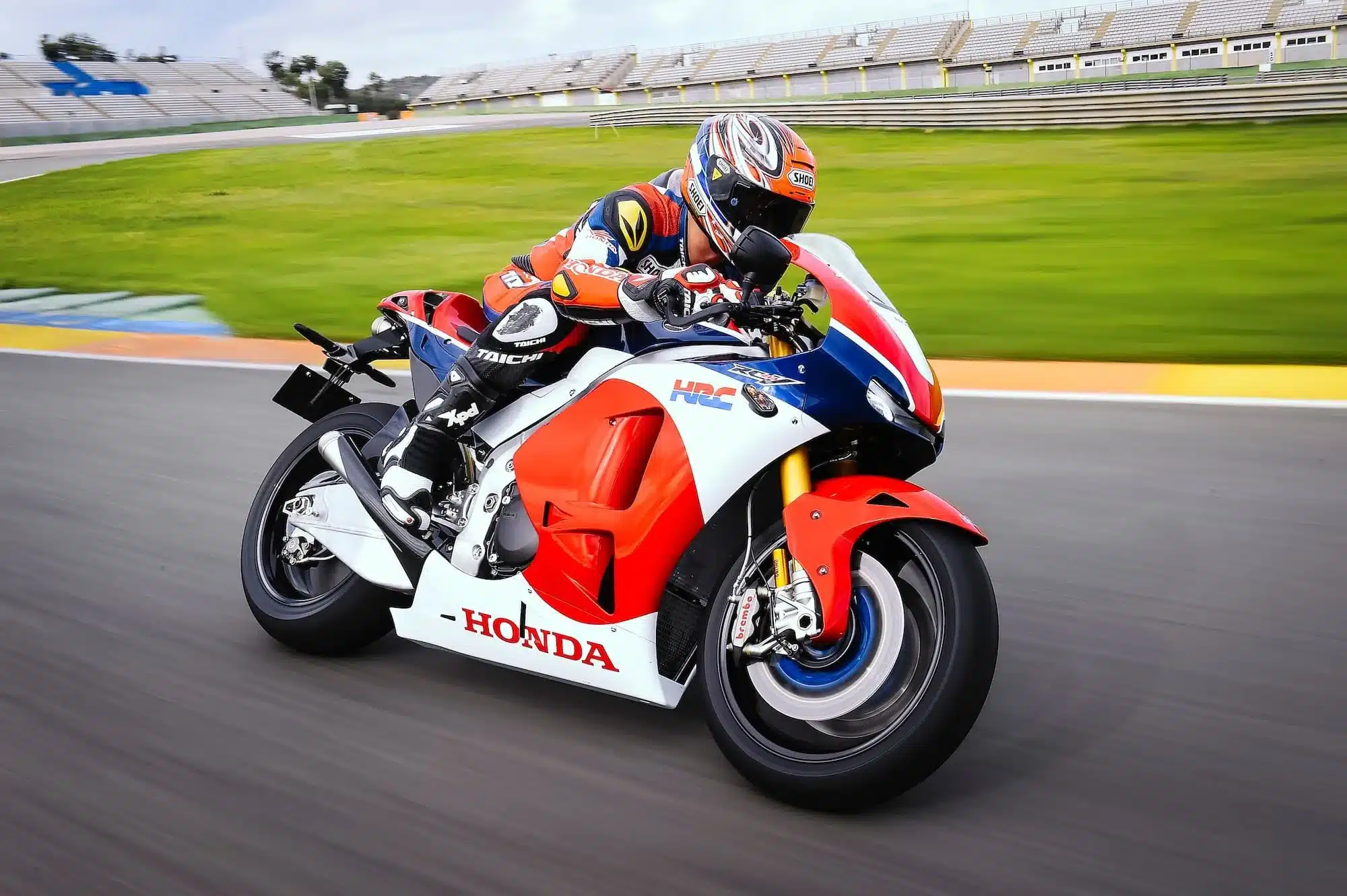 All the V4 Motorcycles You Can Buy New or Used (2026) 20 Honda RC213V-S V4 road bike ridden on a racetrack