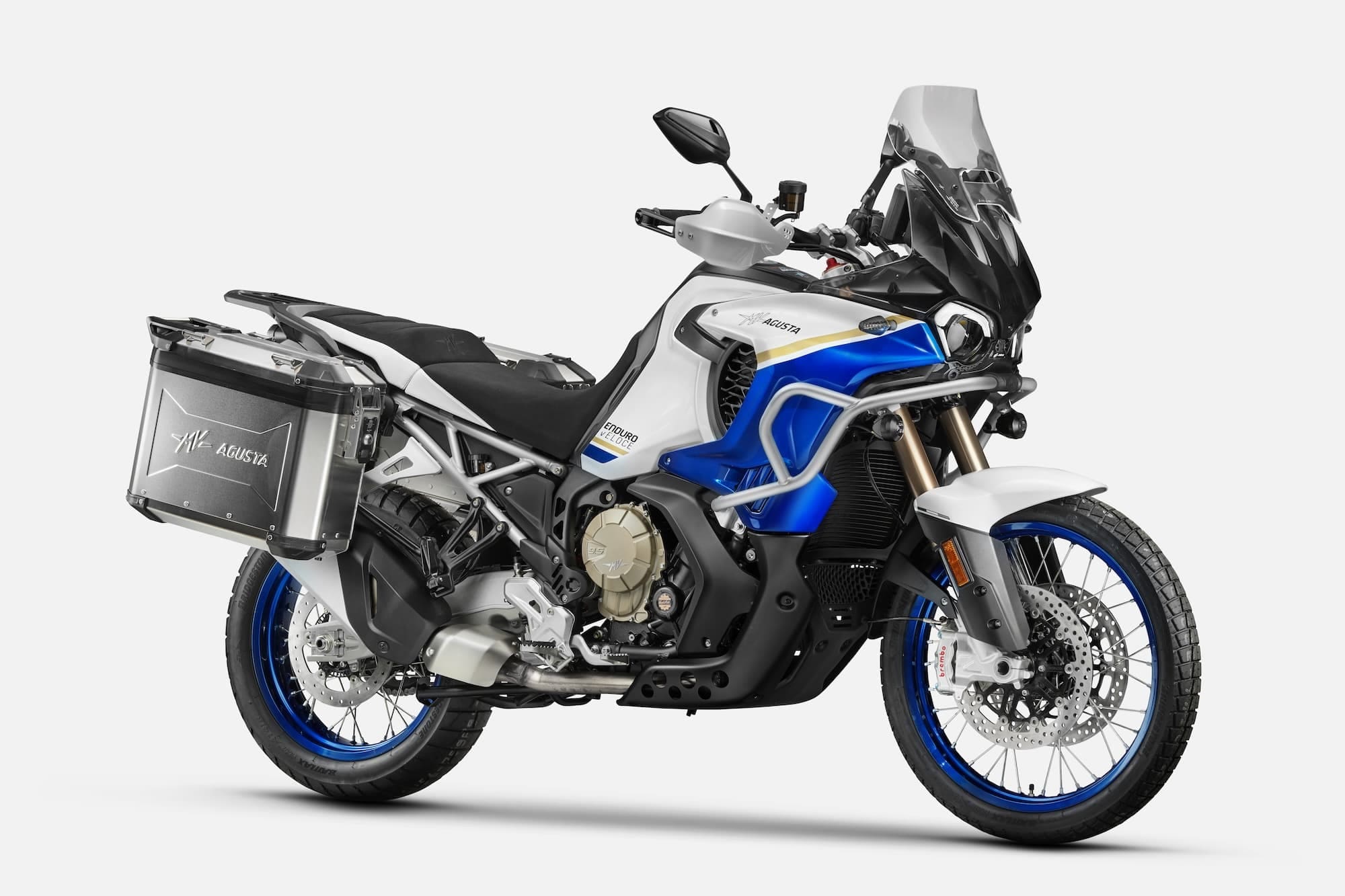 All the Middleweight Adventure Motorcycles — Complete 2026 Comparison 12 MV Agusta Enduro Veloce in white and blue, right-front three-quarter studio view