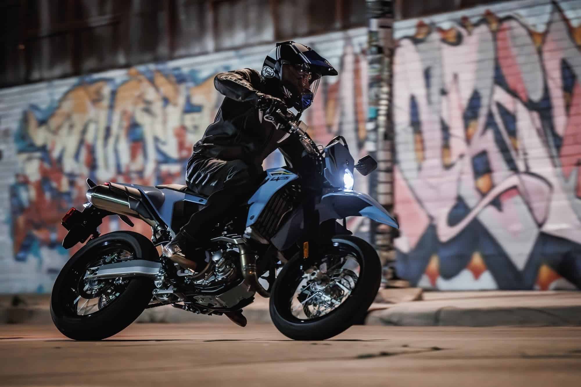 Suzuki DR-Z4S and DR-Z4SM Buyer’s Guide — Somewhat Modern, Still a DR-Z 20 Suzuki DR-Z4SM riding on a city street at night