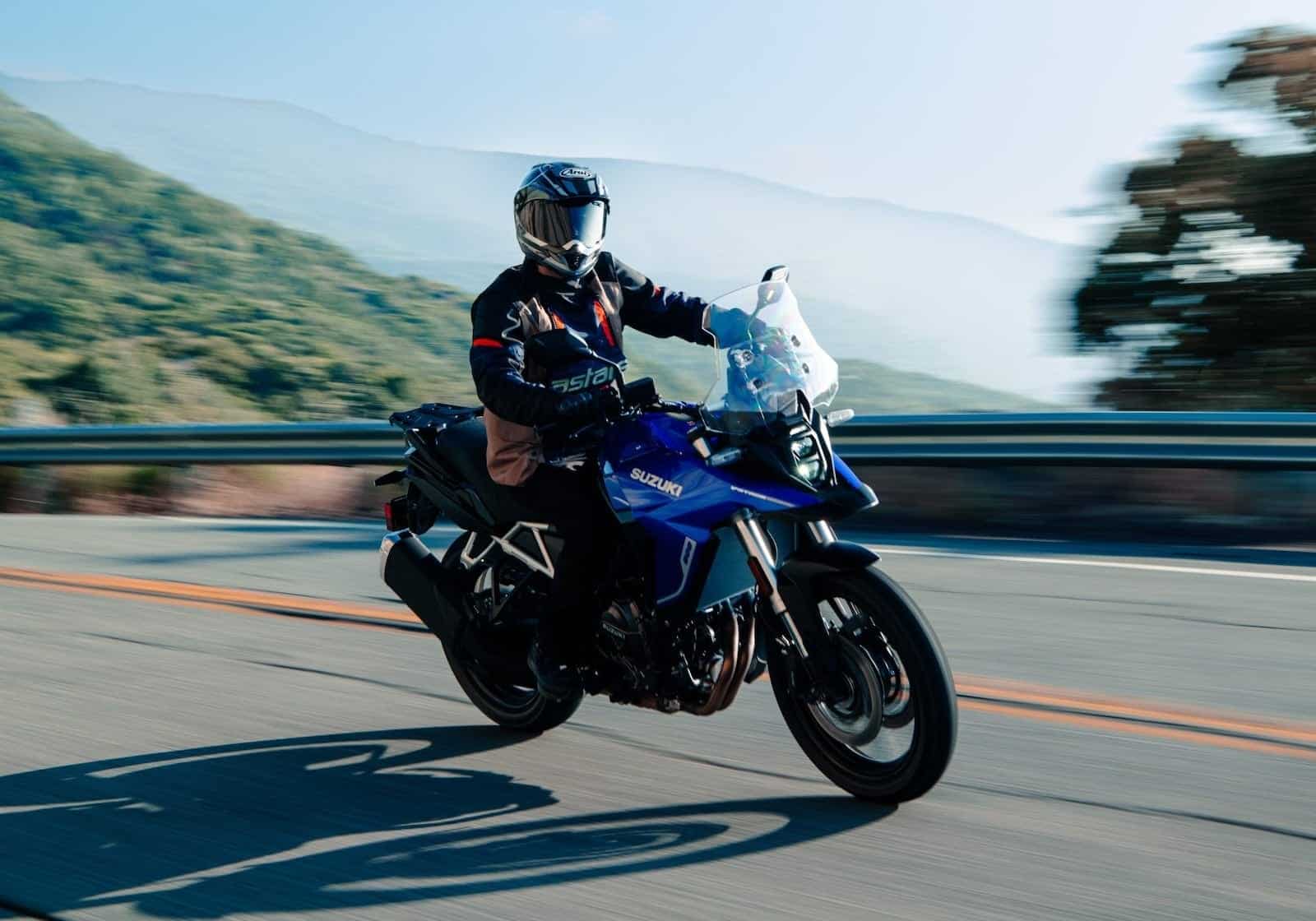 Suzuki V-Strom 800 Buyer’s Guide — RE vs DE, Engine, and Alternatives 8 Suzuki V-Strom 800RE riding on a paved mountain road
