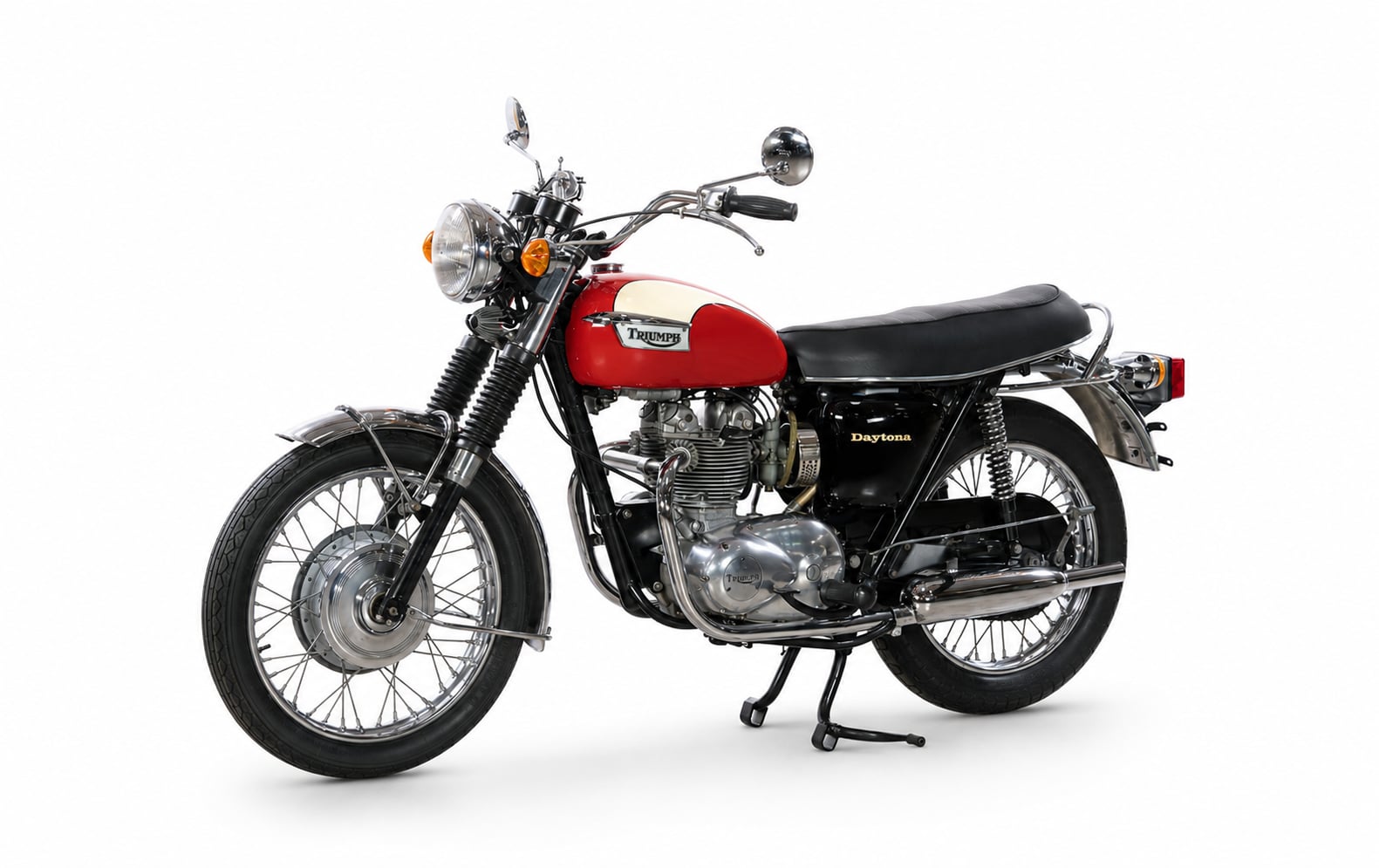 Triumph Daytona Model History and Buyer’s Guide (1967-2026) 2 Red and white 1967-1974 Triumph T100R Daytona in a studio