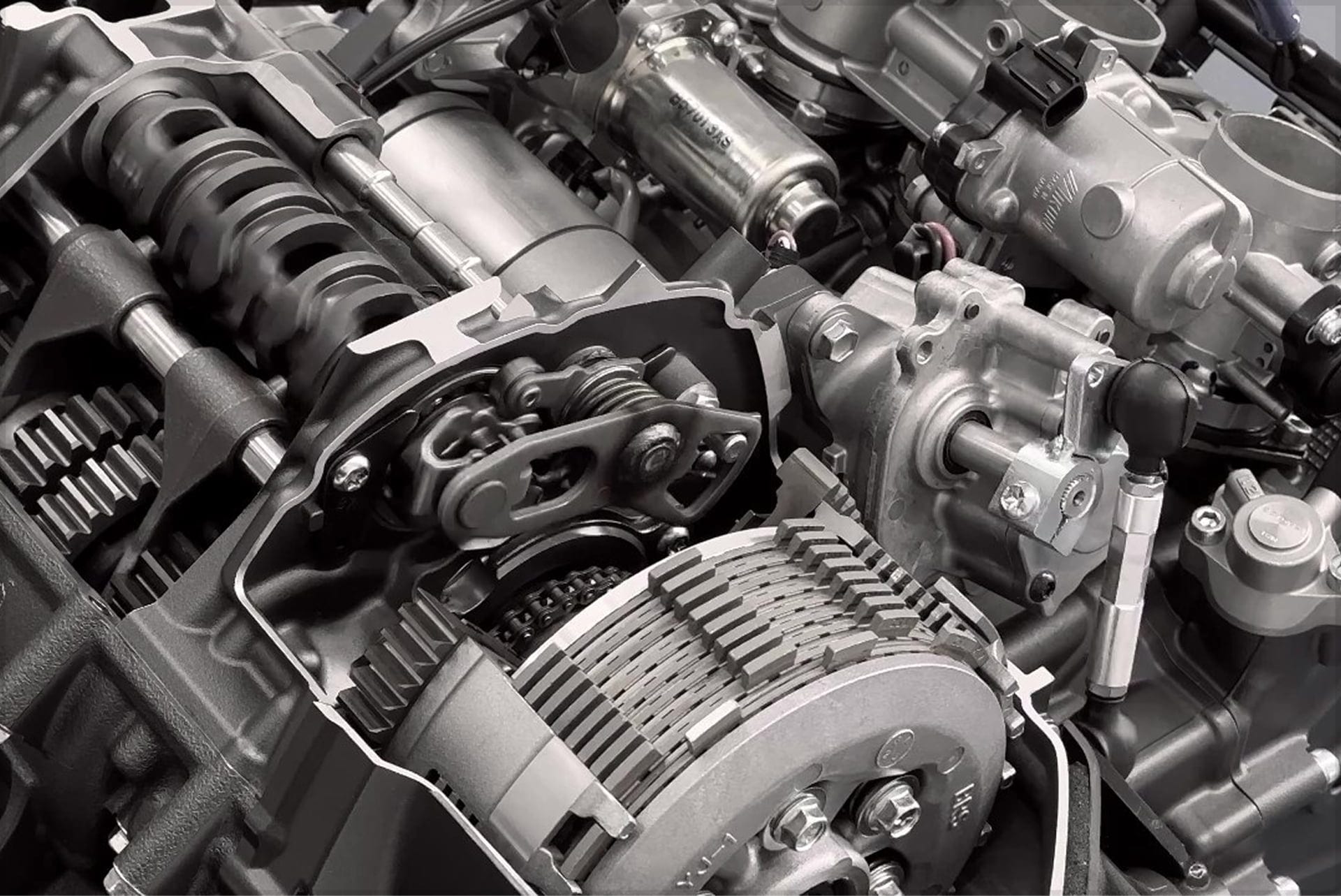 Automatic Motorcycle Transmissions Compared: DCT, AMT, E-Clutch and More 4 Yamaha Y-AMT engine cutaway at the Japan Mobility Show