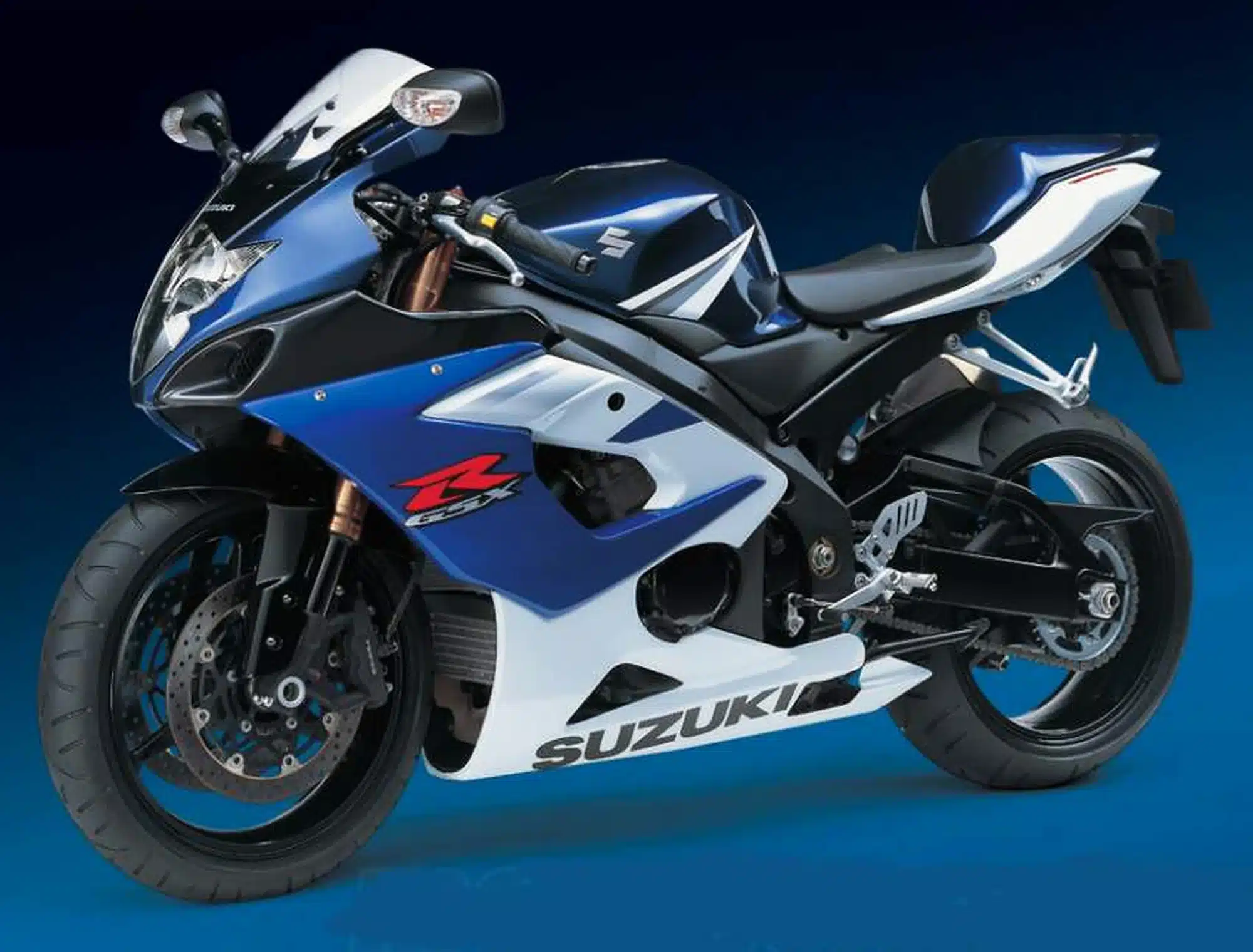 The K5 Suzuki GSX-R1000 — The Legend of Godzilla 5 Blue and white 2005 Suzuki GSX-R1000 K5 from the left front three-quarter angle