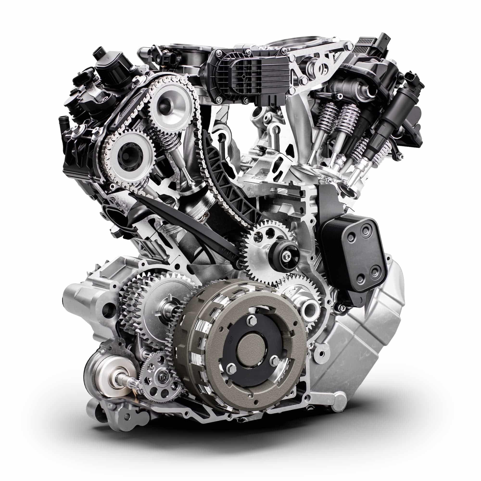 Automatic Motorcycle Transmissions Compared: DCT, AMT, E-Clutch and More 7 2025 KTM AMT engine cutaway with the clutch, transmission and shift hardware exposed