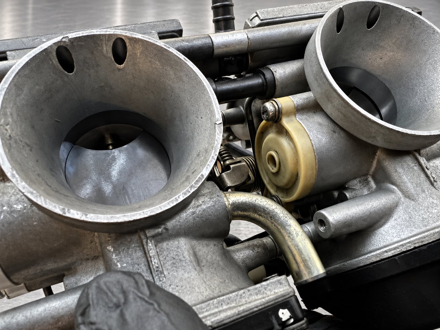 The Case for Carburettors in Motorcycles 3 Two open intake bellmouths on Ducati Monster M900 Mikuni carburettors